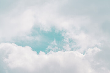 The blue sky seen through the clouds