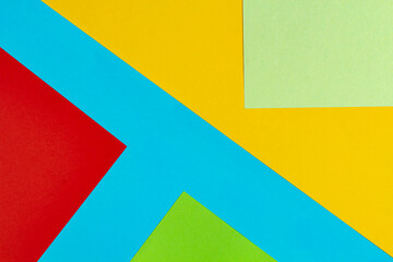 Abstract colored background from colored paper, top view, place for text.