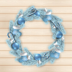 Christmas holidays. Christmas wreath on  wooden texture background.
