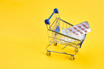 drug trolleys service delivery shopping pharmacy yellow background