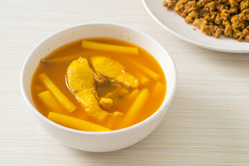 Sour soup with lotus stem and fish