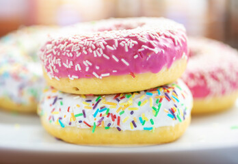 Various colorful doghnut with sugar decoration
