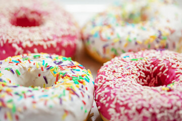 Various colorful doghnut with sugar decoration