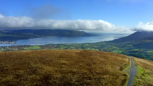 Carlingford Lough, Louth, Ireland, October 2021. Drone pushes west along the Tain Way towards Bavan and Omeath while gradually panning north to Warrenpoint.