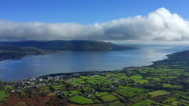 Carlingford Lough, Louth, Ireland, October 2021. Drone tracks east towards Warrenpoint in Northern Ireland above Bavan and Omeath.