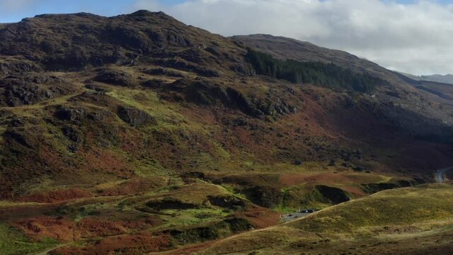 Carlingford Mountains, Louth, Ireland, October 2021. Drone pushes southeast across the hills, gradually ascending above the rugged landscape.