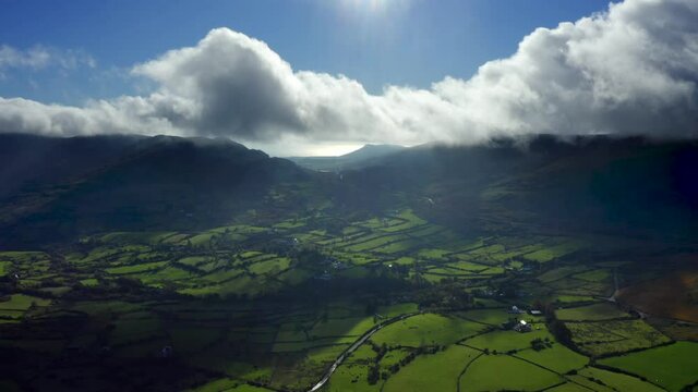 Carlingford Mountains, Louth, Ireland, October 2021. Drone tracks west above Omeath while facing south towards Dundalk Bay.