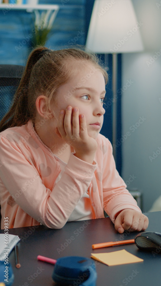 Poster bored pupil looking at computer screen for online lesson learning for education. schoolgirl feeling 