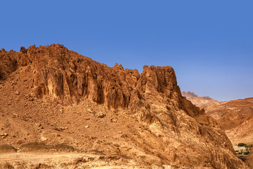 Fototapeta na wymiar Mountain oasis Chebik, Sahara Desert. View of the Atlas mountain range. Tunisia