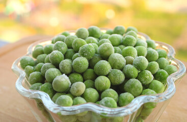 Frozen green peas in the bowl, green vegetables