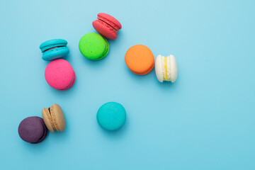 macarons on a turquoise background Pastel Almond Cookies, Vintage
