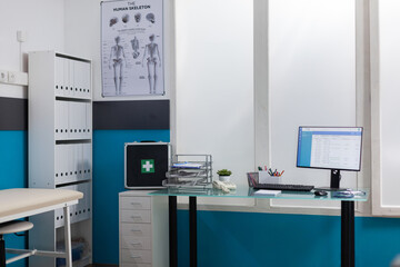 Empty medical office with equipment and instruments to consult patients with illness and sickness. Nobody in healthcare space used to give diagnosis and treatment to sick people.