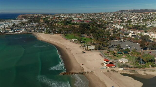 Rotating aerial view over Doheny State Beach in Dana Point, California