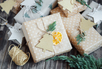 Christmas  decorative homemade gift box wrapped in brown kraft paper