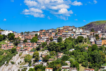 Photograph of low-income peripheral community popularly known as “favela” in Rio de Janeiro, Brazil © @renatopmeireles