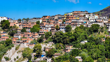 Photograph of low-income peripheral community popularly known as “favela” in Rio de Janeiro, Brazil © @renatopmeireles
