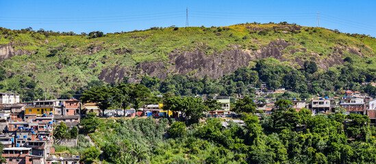 Photograph of low-income peripheral community popularly known as “favela” in Rio de Janeiro, Brazil © @renatopmeireles