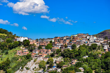 Photograph of low-income peripheral community popularly known as “favela” in Rio de Janeiro, Brazil © @renatopmeireles