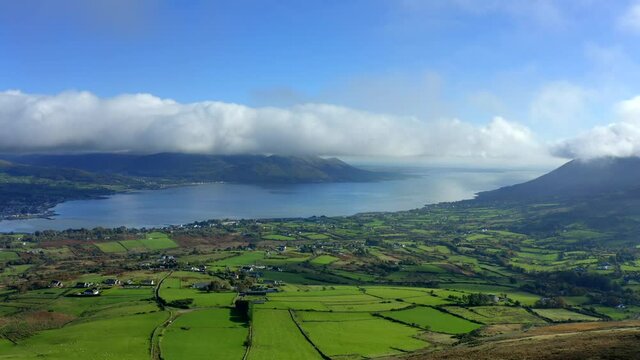 Carlingford Lough, Louth, Ireland, October 2021. Drone pushes west towards Bavan and Omeath.