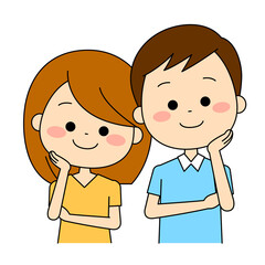 照れながら寄り添い微笑んでいる二人