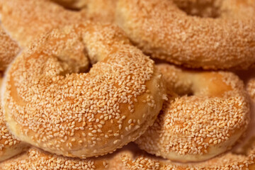 Bagels with sesame seeds, freshly baked bagels close - up view