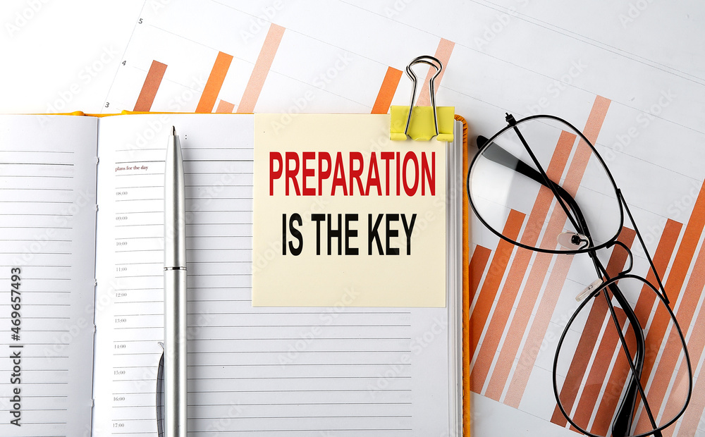 Poster text preparation is the key on sticker on notepad on diagram background