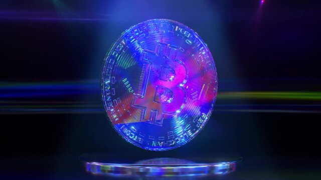Diamond bitcoin rotates on a dark background with neon lighting. Cryptocurrency. Lowpoly. 3d animation of seamless loop
