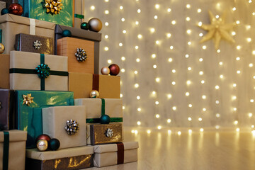 pile of Christmas gift boxes on wooden floor over led lights