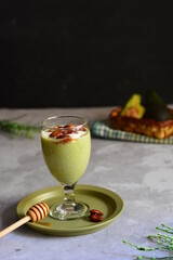 Iced refreshing juice Avocado, honey, nuts and cream