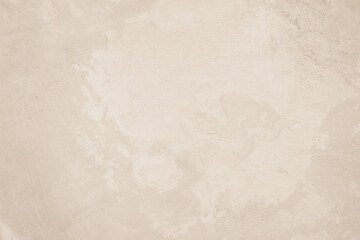 Cream concreted wall for interiors or outdoor exposed surface polished concrete. Cement have sand and stone of tone vintage.