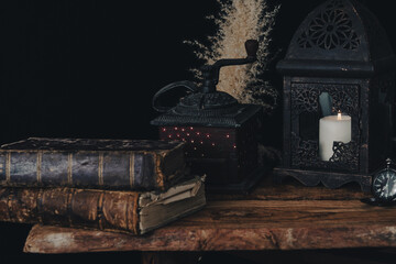 Dark wallpaper romantic scene of books, candles and mystery.