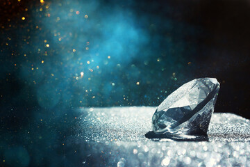 diamond close up over bright sparkling background - obrazy, fototapety, plakaty