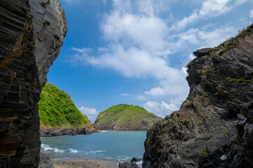 Naklejka premium Nature, rocks, blue sea, blue sky, beautiful bay