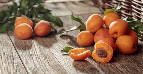 Fresh apricots on a old wooden table.