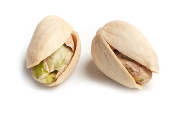 Peeled and unpeeled pistachios on isolated background for package or label design including