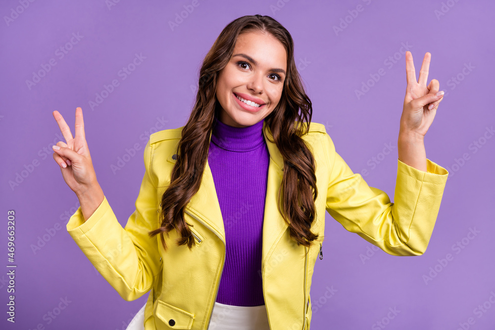 Sticker Photo of young cheerful lady have fun show fingers peace v-symbol isolated over violet color background