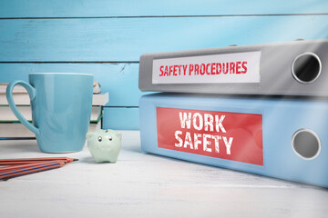 Work Safety and Safety Procedures concept. Wooden table and office supplies