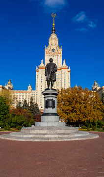View of the monument to Mikhail Vasilyevich Lomonosov ( autumn sunny day)from the side of the main building of Moscow State University (MSU) on Sparrow Hills, Russia