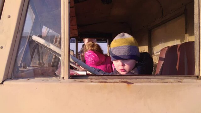 Children in cabin of the truck rural life