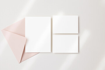 Mockup blank cards 5x7 and 3,5x5 with pink envelope 