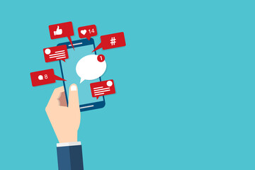 Social Media Smart Phone, Viral content, social media marketing and social media activity - likes, shares and comments popping up on the mobile screen