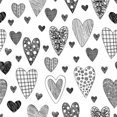 Seamless background of different abstract hearts. A pattern of hearts drawn by hand in a sketch style. Graphics. Engraving