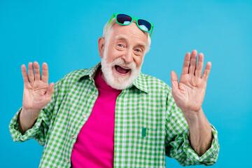 Photo of cheerful happy cool positive old granddad weekend vacation summer mood isolated on blue...