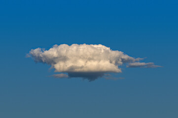 Blue background with a light cloud in the center. The object for the collage.