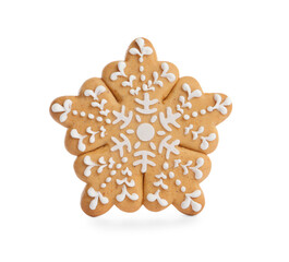 Tasty gingerbread cookie in shape of snowflake on white background. St. Nicholas Day celebration