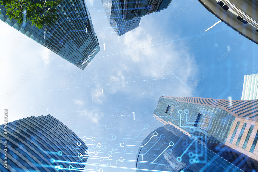 Poster technology hologram over low angle shot of singapore skyscrapers. the largest tech hub in southeast 