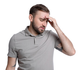 Young man suffering from headache on white background