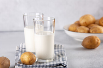 Potato milk in glasses. Plant-based alternative milk