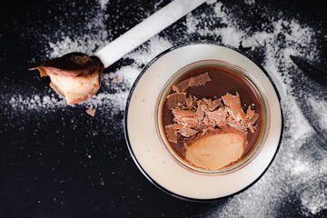 Panna cotta sweet dessert creamy on black background dark photo