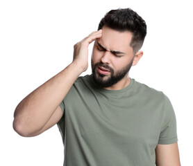 Young man suffering from headache on white background